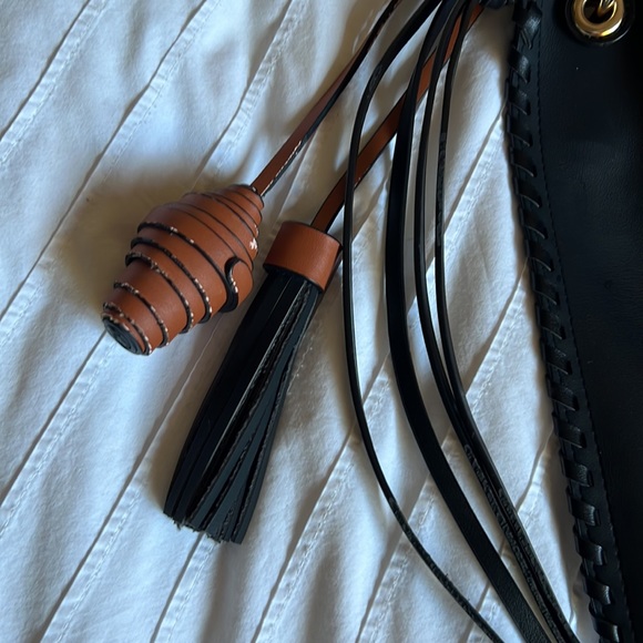 Anthropologie BLACK polyurethane purse w tassels and fringe. - Picture 2 of 8